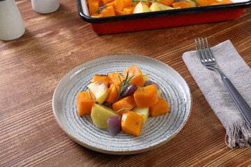 zucca gialle e patate al forno