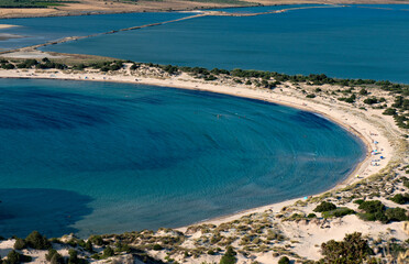 Amazing beach with golden sand. One of the best greek beaches, Gialova Lagoon, Voidokilia Beach, Peloponnese, Greece.