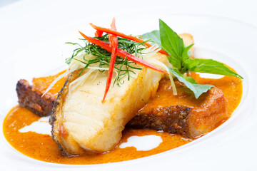 Panang Salmon in a white plate