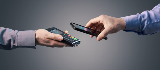 Man paying with his smartphone