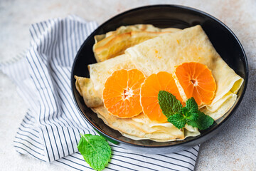 crepes thin pancake citrus Shrovetide holiday Maslenitsa sweet dessert breakfast pancakes healthy...