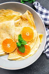 crepes thin pancake citrus Shrovetide holiday Maslenitsa sweet dessert breakfast pancakes healthy...