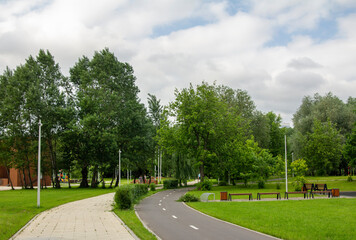 Park on the outskirts of Moscow in the Kapotnya district, pedestrian and bicycle roads. Public space for local residents to relax