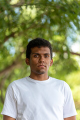 Portrait of confident young latino man wearing t-shirt