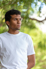 Portrait of confident young latino man wearing t-shirt