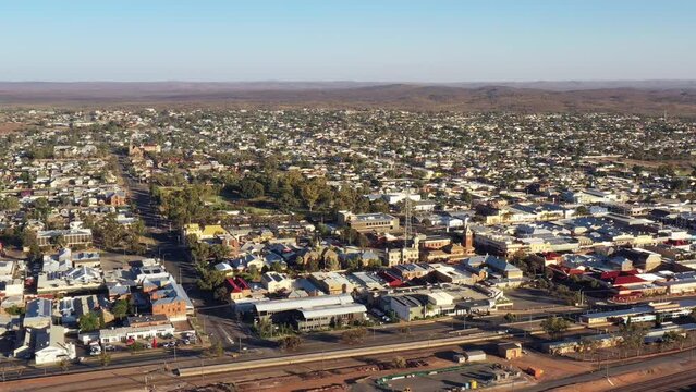 Over Broken Hill silver city downtown and historic open pit mine &ndash; aerial 4k.
