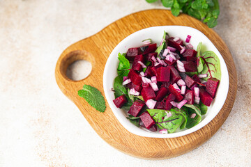 beetroot salad mix leaves green beet vegetable fresh dietary healthy meal food diet snack on the table copy space food background rustic top view keto or paleo diet veggie vegan or vegetarian food