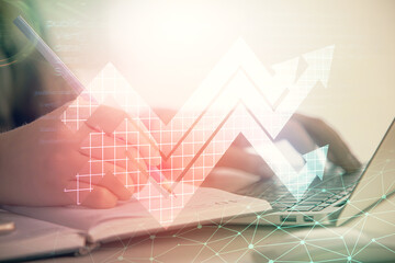 Double exposure of woman hands typing on computer and arrows drawing. Success concept.