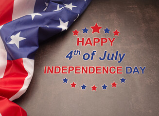 Top view of the American flag with text Happy 4th of July Independence day on vintage background.