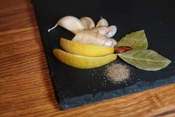 Adobo spices on a stone plate