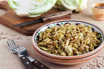 Fried white cabbage with caraway seeds and curry powder
