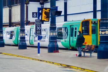 train arriving at railway station in the city
