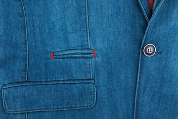 Denim blue formal suit with a pocket fragment for background. Elegant denim suit. Male jacket with pocket and buttons - 482155289
