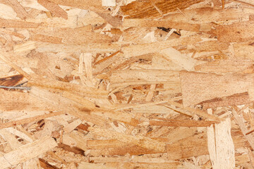 Wood texture. Osb wood board for background decoration. OSB board texture. Brown wooden background. - 482155290