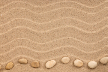 Curved line of white stones lying on the dunes. With space for design, text place