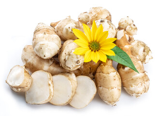 Jerusalem artichoke roots with leaves and flower of Jerusalem artichoke isolated on white background.
