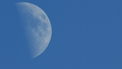 Photograph of Moon in the first quarter lunar phase.