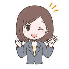 ビジネススーツ姿でOKサインを出す若い女性