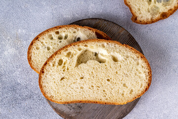 white texture bread on a round wooden board