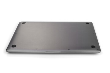 Bottom of a slim laptop on a white background