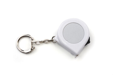 Tape measure keychain on a white background