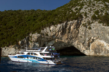 BEAUTIFUL BLUE SEA WILD ROCKS AND BEAUTIFUL CAVES ON THE ISLANDS OF THE IONIAN SEA, PAXOS, AND ANTIPAXOS IN  - 482166209