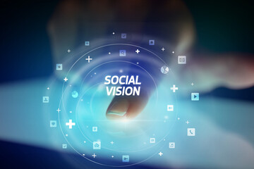 Finger touching tablet with social media icons concept