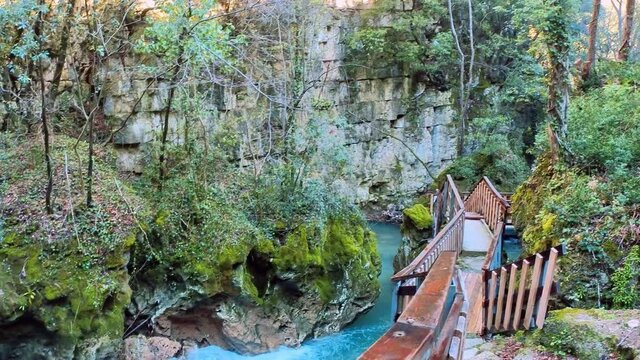 crystal clear stream running through a pristine valley in the town of Pioraco in the Marche region, Italy
