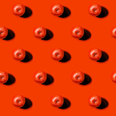 Isolated red apples on red background
