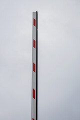 red white gate road barrier.