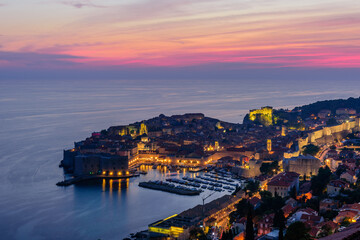 Obraz premium Sightseeing of Croatia. Beautiful sunset view of Dubrovnik old town, Croatia 