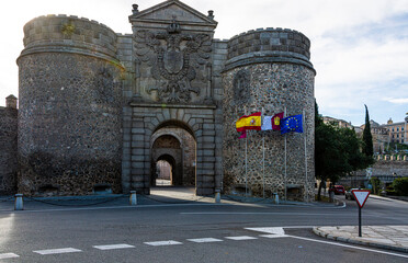 Walls and main entrance gate to the historic city of Toledo. Spain. - 482178834