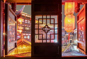 At night, the streets of Ciqikou Ancient Town are full of lanterns, Chongqing, China.Chinese translation:Happy New Year