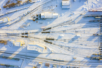 Branches of the railway at the marshalling yard, a lot of freight wagons from the height.
