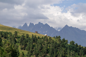 Amazing view from the Tskahazagari peak on the Svaneti mountain peaks near Mestia in the Greater Caucasus Mountain Range, Upper Svaneti,Country of Georgia.Hiking trail to the Koruldi Lakes.Cottage,hut