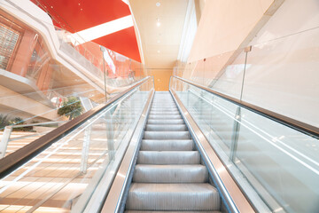 Escalator for indoor space of shopping center