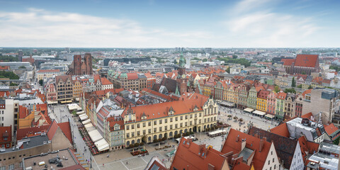 Fototapeta na wymiar Panoramic aerial view of Market Square with the New and Old Town Hall and St Mary Magdalene Church - Wroclaw, Poland