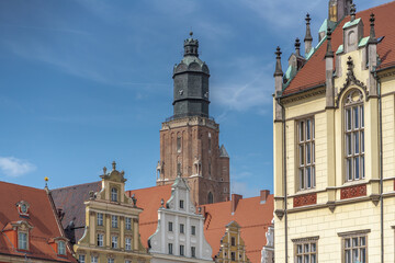Fototapeta na wymiar St Elizabeth's Church Tower and Market Square buildings - Wroclaw, Poland