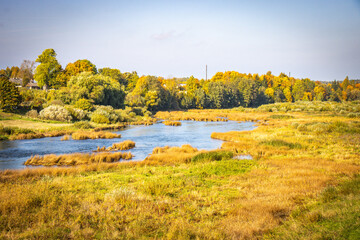 Fototapeta na wymiar autumn colours in Kuldiga, Latvia, autumn, Venta River, Baltics, Baltic countries, Baltics, Europe
