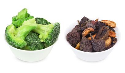 Frozen vegetables and dry fruits on an isolated white background. Frozen and dry food. frozen broccoli