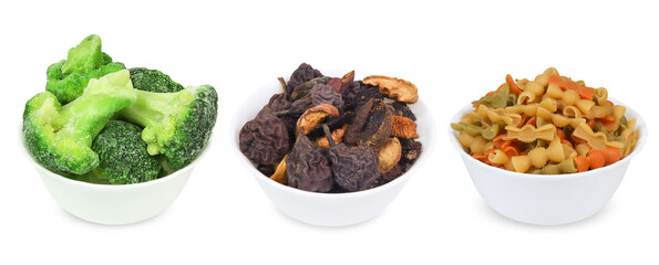 Frozen vegetables, dry fruits and pasta on an isolated white background. Different types of vegetarian food. frozen broccoli