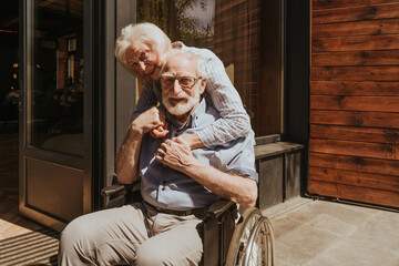 Senior couple, wife takes care of invalid husband