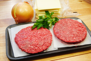 Fresh Cheeseburger Ingredients with Lean Raw Ground Beef