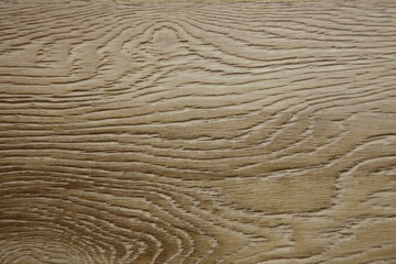 Weathered surface of an outside strong wooden table light brown color background texture