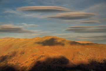 Fototapeta na wymiar Lenticular clouds above fells in the English Lake District
