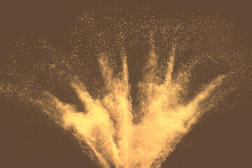Abstract multicolored powder splatted on brown background, Freeze motion of color powder exploding....