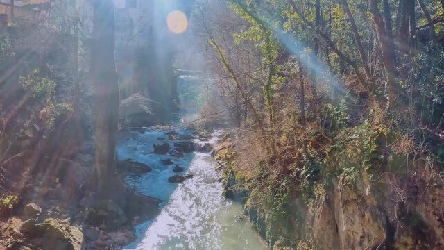 crystal clear stream running through a pristine valley in the town of Pioraco in the Marche region, Italy