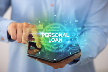 Businessman holding a foldable smartphone, new business concept