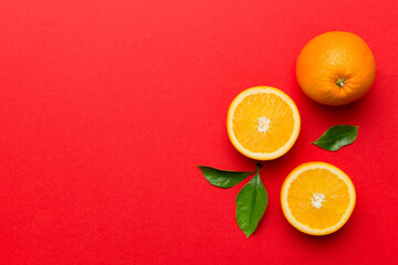fresh Fruit orange slices on colored background. Top view. Copy Space. creative summer concept. Half of citrus in minimal flat lay with copy space