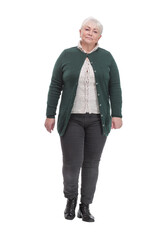 Portrait of happy businesswoman walking on white background